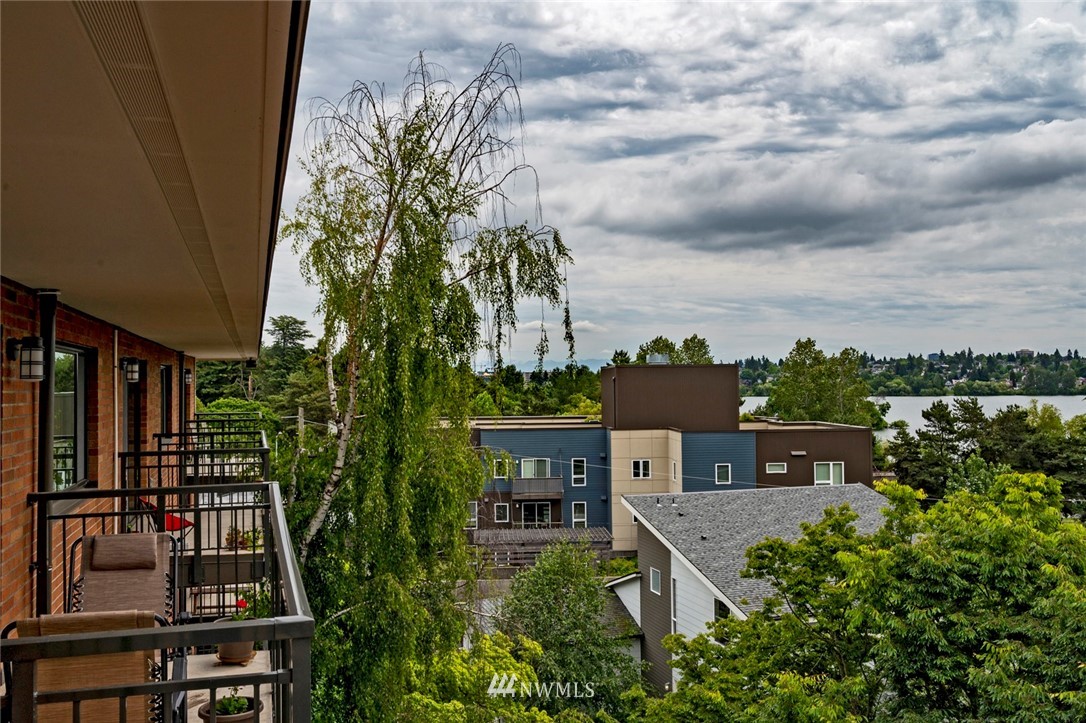 911 North 73rd Street, Unit 407 Seattle, WA 98103 - Photo 13 of 27 an aerial view of a house with outdoor space