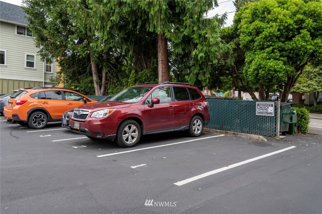 911 North 73rd Street, Unit 407 Seattle, WA 98103 - Photo 25 of 27 a view of a car parked in front of a house