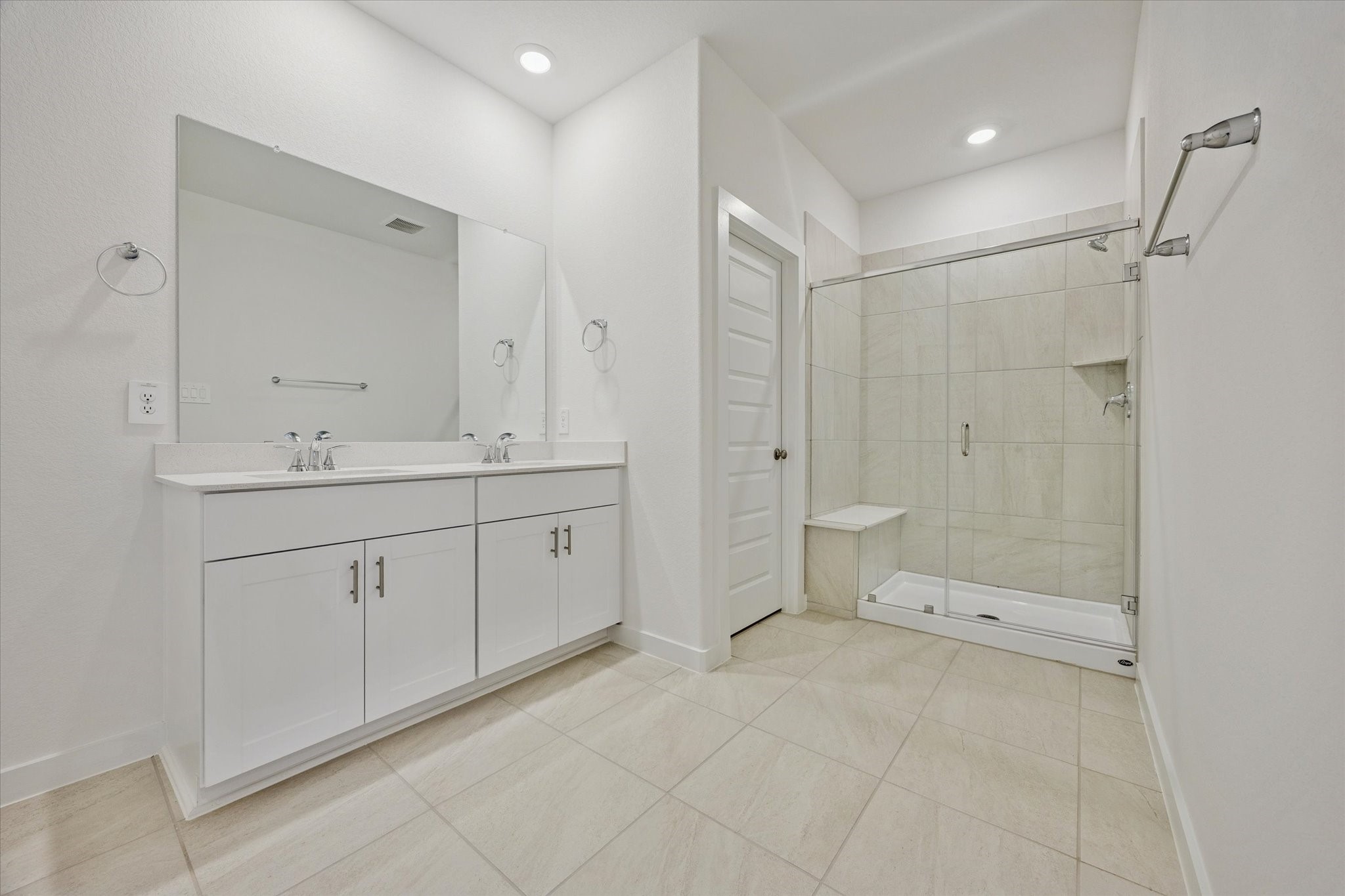 4113 Fig Grv Street Houston, TX 77080 - Photo 8 of 22 Primary bath features dual sinks and a standing shower.