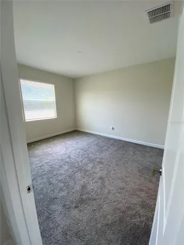 an empty room with a natural light
