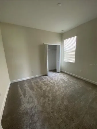 an empty room with window