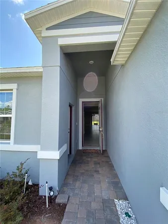 a view of a hallway to a house