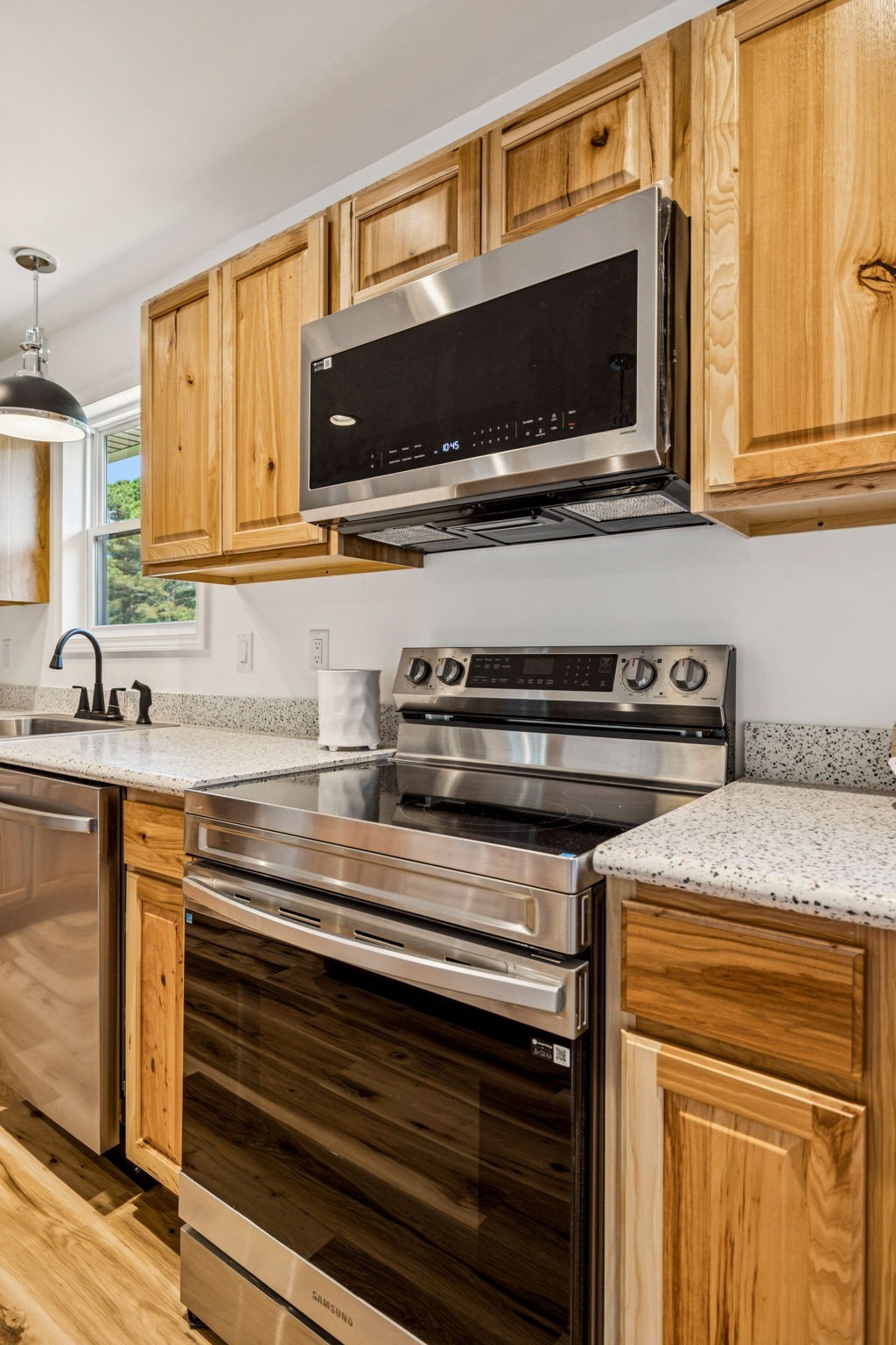 233 Ralph Spivey Lane Gainesboro, TN 38562 - Photo 19 of 45 a kitchen with a stove and a microwave