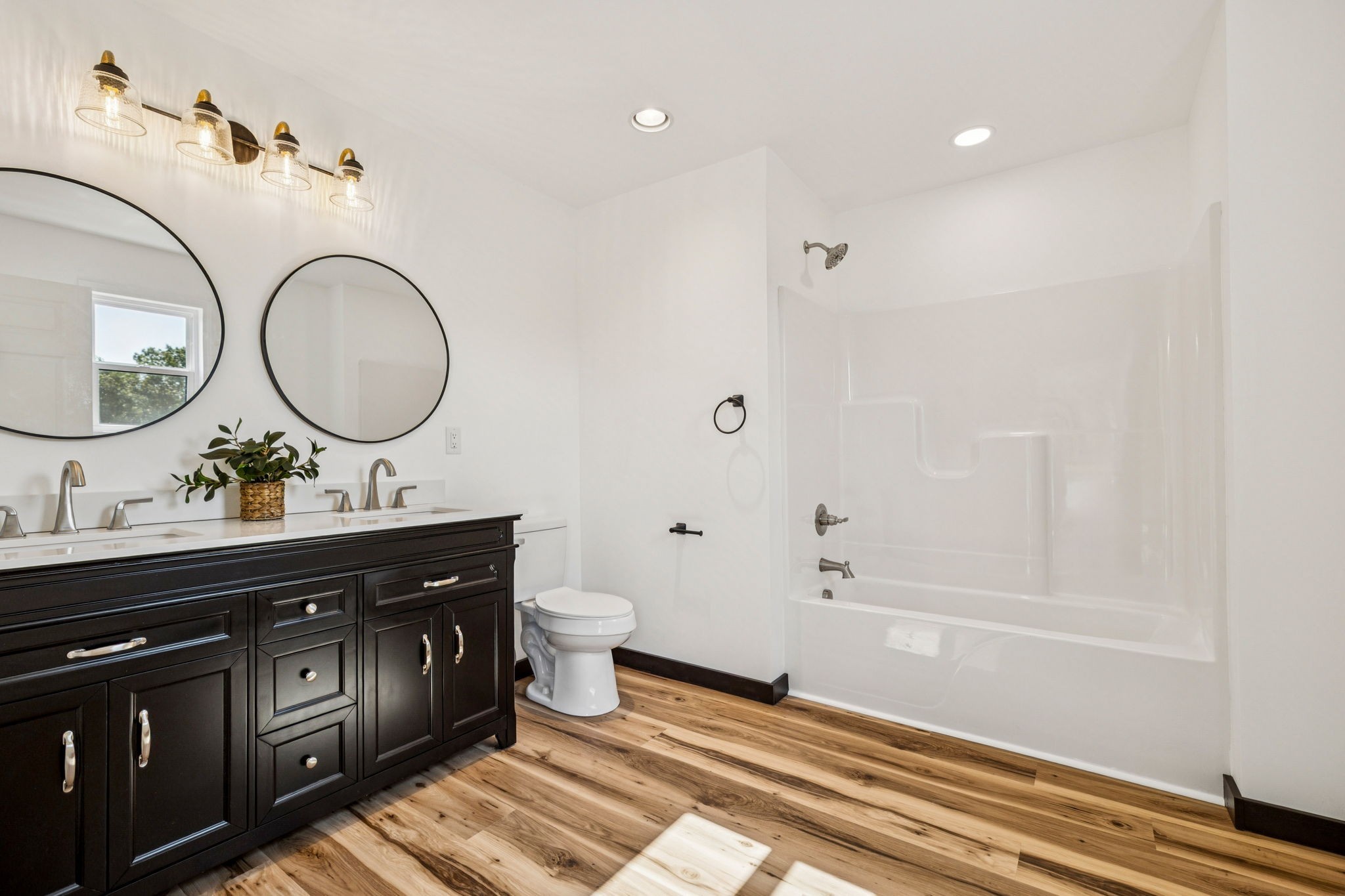 233 Ralph Spivey Lane Gainesboro, TN 38562 - Photo 25 of 45 a bathroom with a toilet sink and mirror