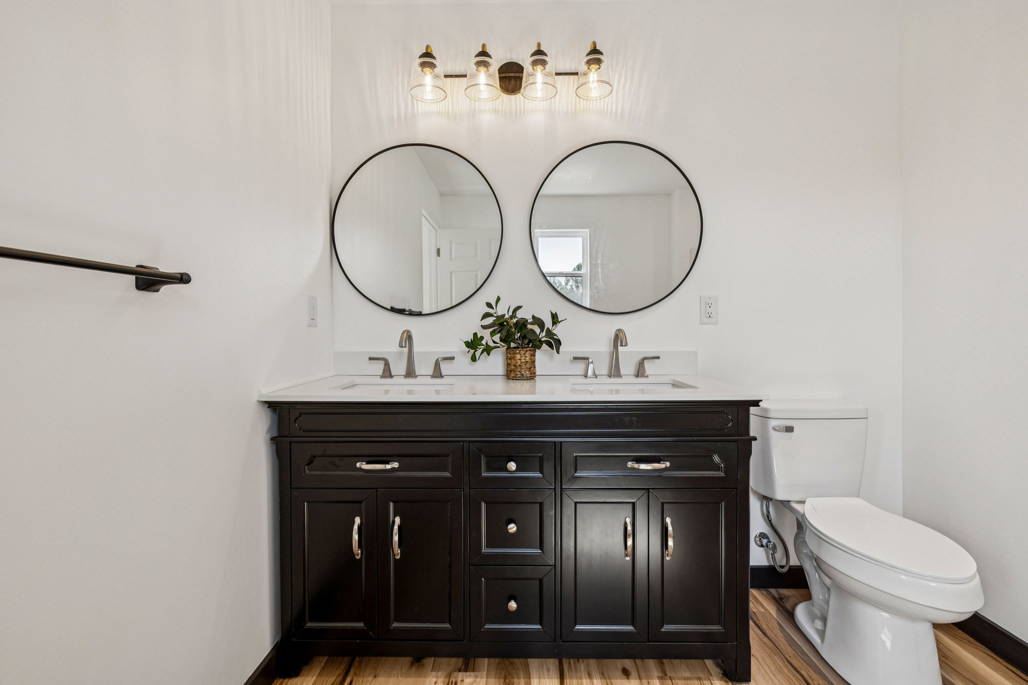 233 Ralph Spivey Lane Gainesboro, TN 38562 - Photo 26 of 45 a bathroom with a toilet a sink and a mirror