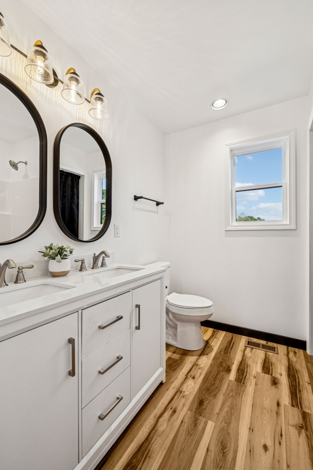 233 Ralph Spivey Lane Gainesboro, TN 38562 - Photo 31 of 45 a bathroom with a toilet sink and mirror