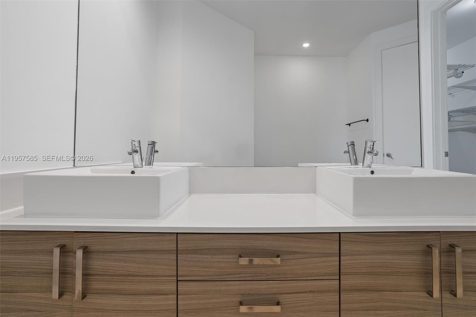 2784 Southwest 34th Avenue Miami, FL 33133 - Photo 23 of 45 a bathroom with a sink and a mirror
