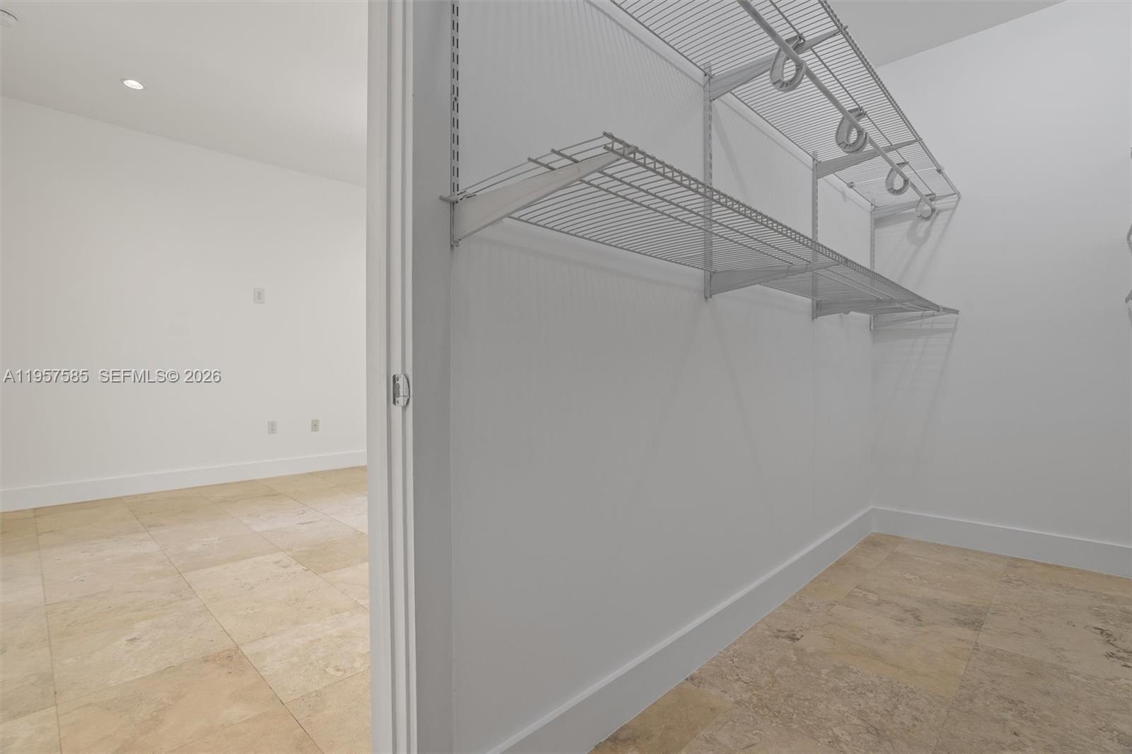 2784 Southwest 34th Avenue Miami, FL 33133 - Photo 25 of 45 a view of a room with racks on the wall