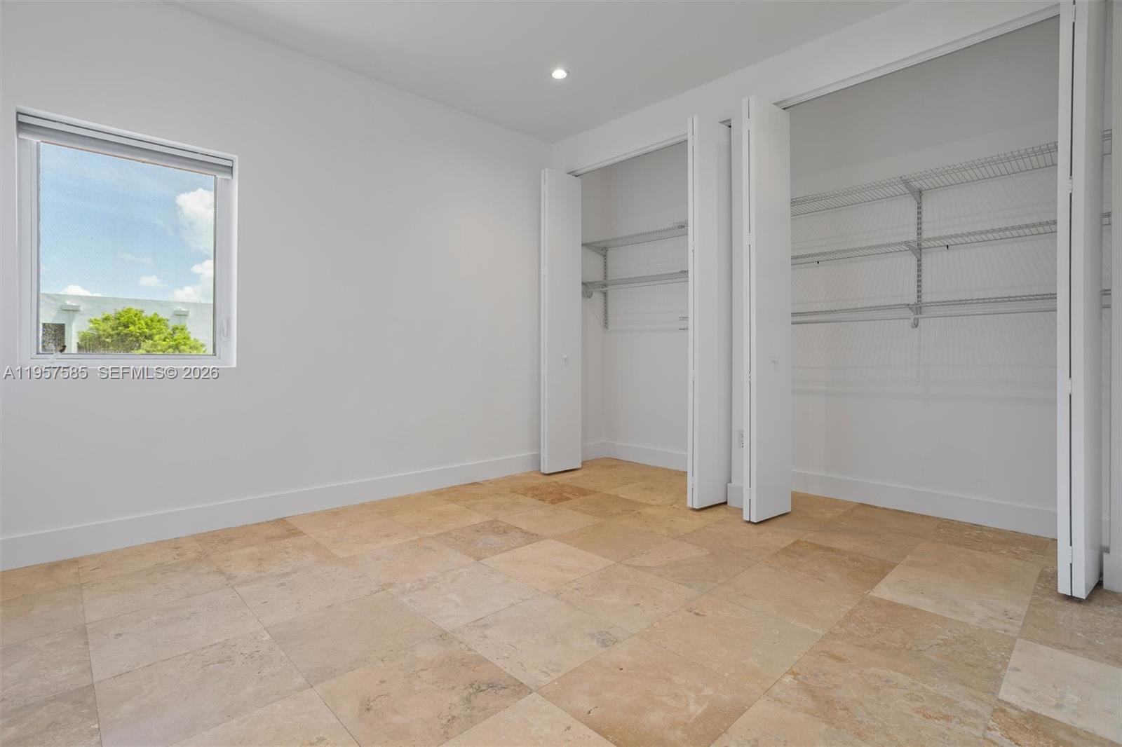2784 Southwest 34th Avenue Miami, FL 33133 - Photo 26 of 45 a view of an empty room with a window