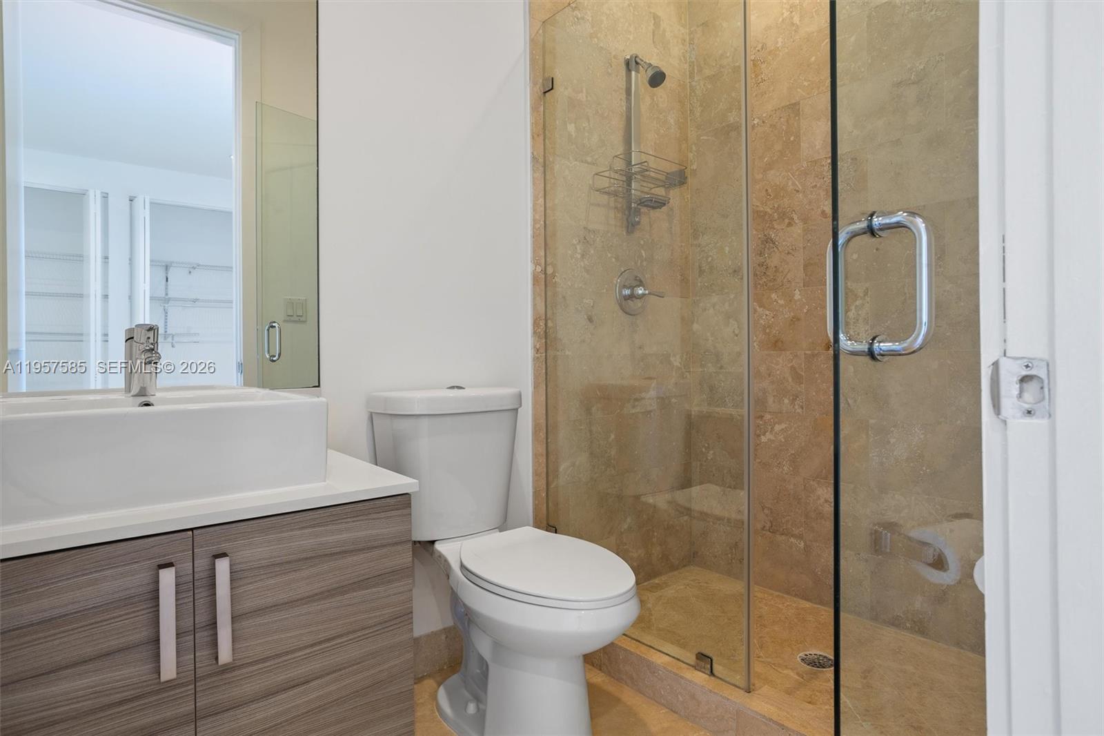 2784 Southwest 34th Avenue Miami, FL 33133 - Photo 28 of 45 a bathroom with a shower a toilet and a sink