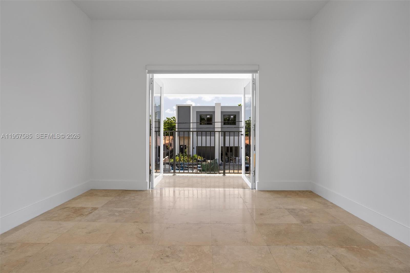 2784 Southwest 34th Avenue Miami, FL 33133 - Photo 29 of 45 a view of an empty room with glass door