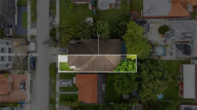 an aerial view of houses and roads