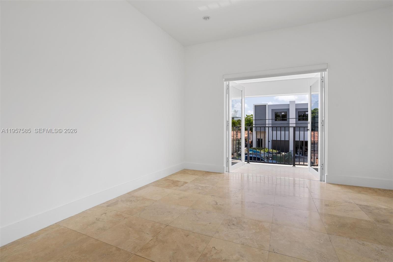 2784 Southwest 34th Avenue Miami, FL 33133 - Photo 32 of 45 an empty room with entrance door