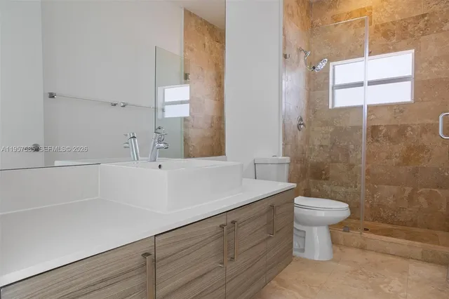 an empty room with entrance door