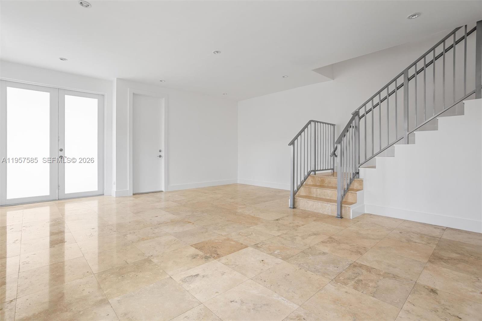 2784 Southwest 34th Avenue Miami, FL 33133 - Photo 10 of 45 a view of an empty room with stairs