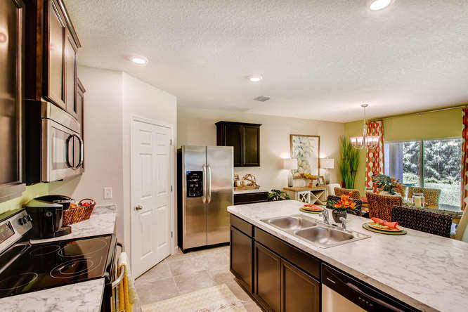 341 Southwest Ridgecrest Drive Port St. Lucie, FL 34953 - Photo 3 of 16 KITCHEN ISLAND