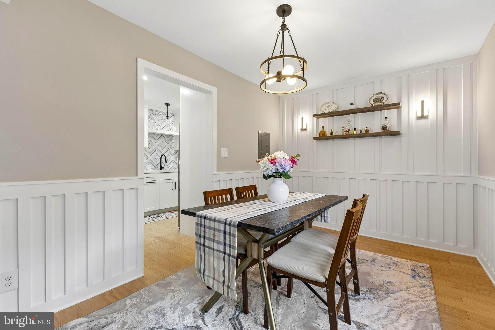 11841 Shire Court, Unit 31D Reston, VA 20191 - Photo 12 of 24 a view of a dining room with furniture