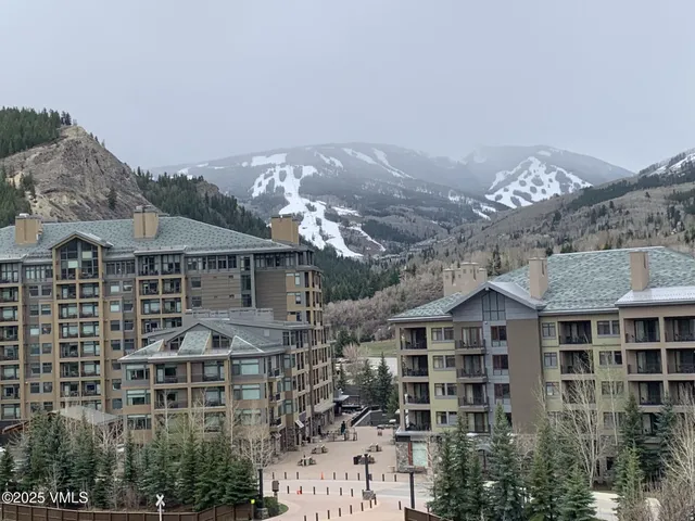 a front view of a building with many windows