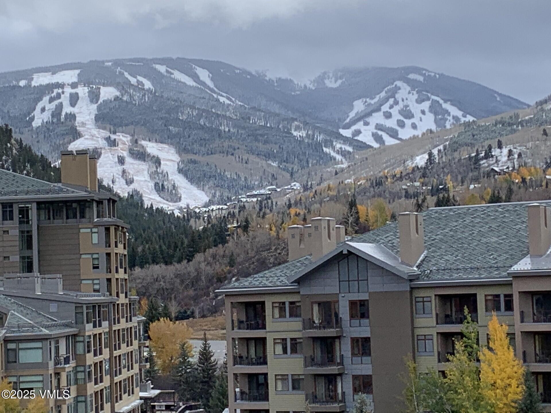 137 Benchmark Road, Unit 520 Avon, CO 81620 - Photo 23 of 26 a view of a large building next to a building