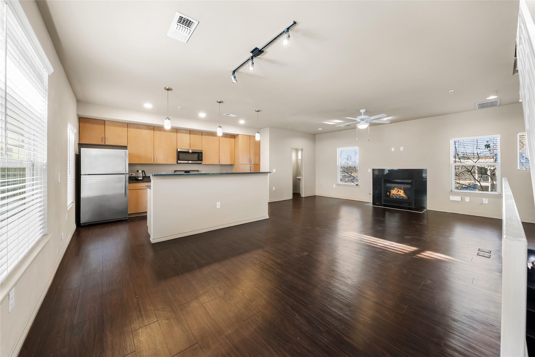 2606 Wilson Street, Unit 901 Austin, TX 78704 - Photo 13 of 37 a view of a kitchen with a sink stove and a window