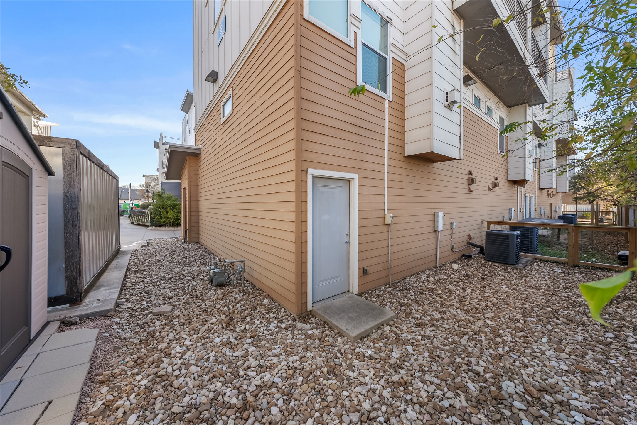 2606 Wilson Street, Unit 901 Austin, TX 78704 - Photo 26 of 37 a view of a house with backyard and sitting area
