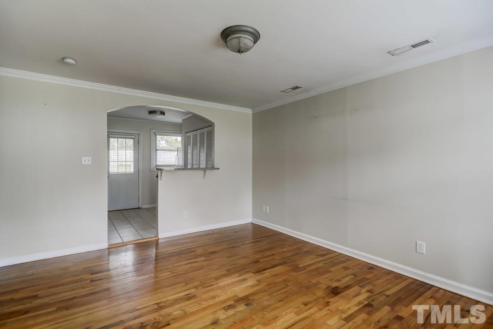 2325 Bernard Street, Unit 2325 Raleigh, NC 27608 - Photo 4 of 10 wooden floor in an empty room