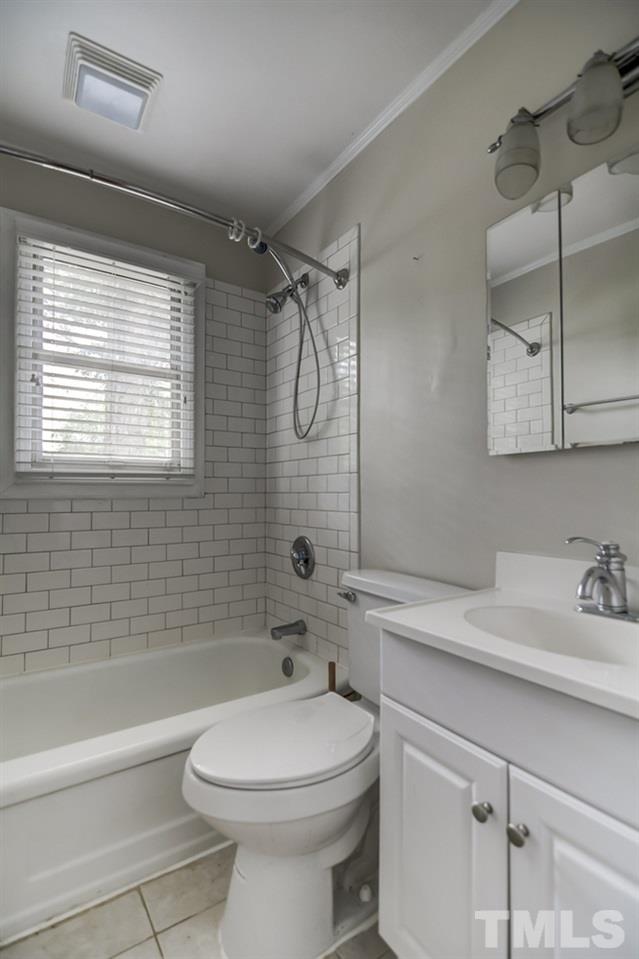 2325 Bernard Street, Unit 2325 Raleigh, NC 27608 - Photo 9 of 10 a bathroom with a sink a toilet and shower