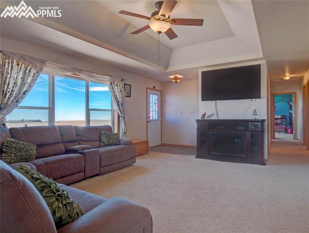 40250 Alford Road Simla, CO 80835 - Photo 4 of 26 The living room showing the hallway going to the bedrooms and baths.