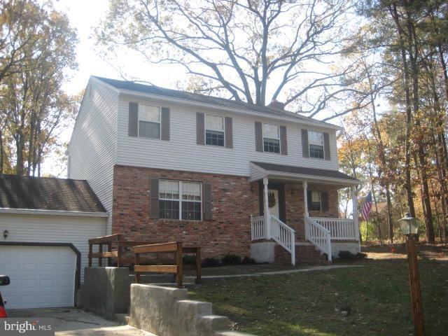 705 Sycamore Leaf Road Severn, MD 21144 - Photo 2 of 18 a front view of a house with a yard