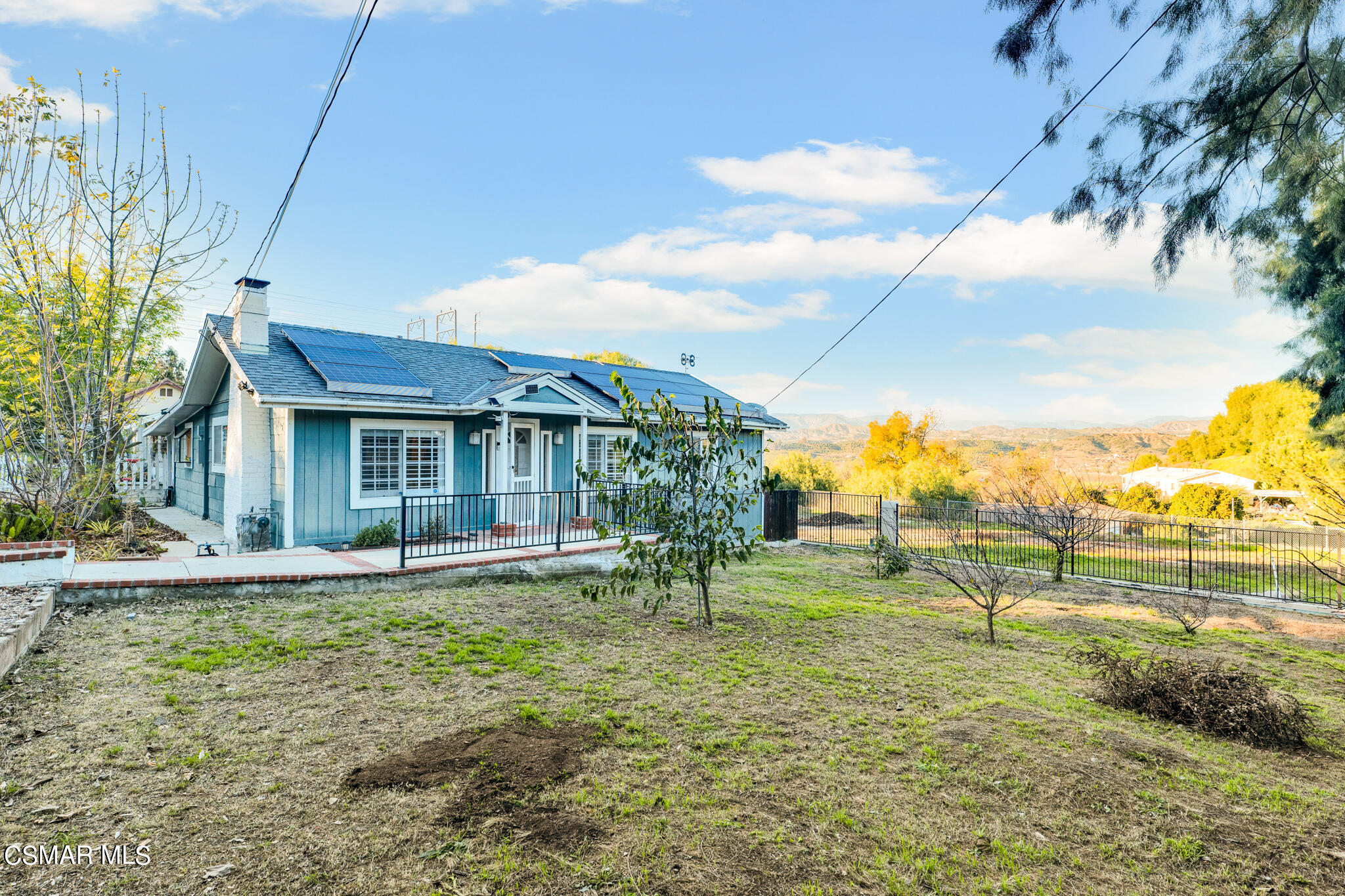 10767 Citrus Drive Moorpark, CA 93021 - Photo 11 of 65 a view of a house with a yard
