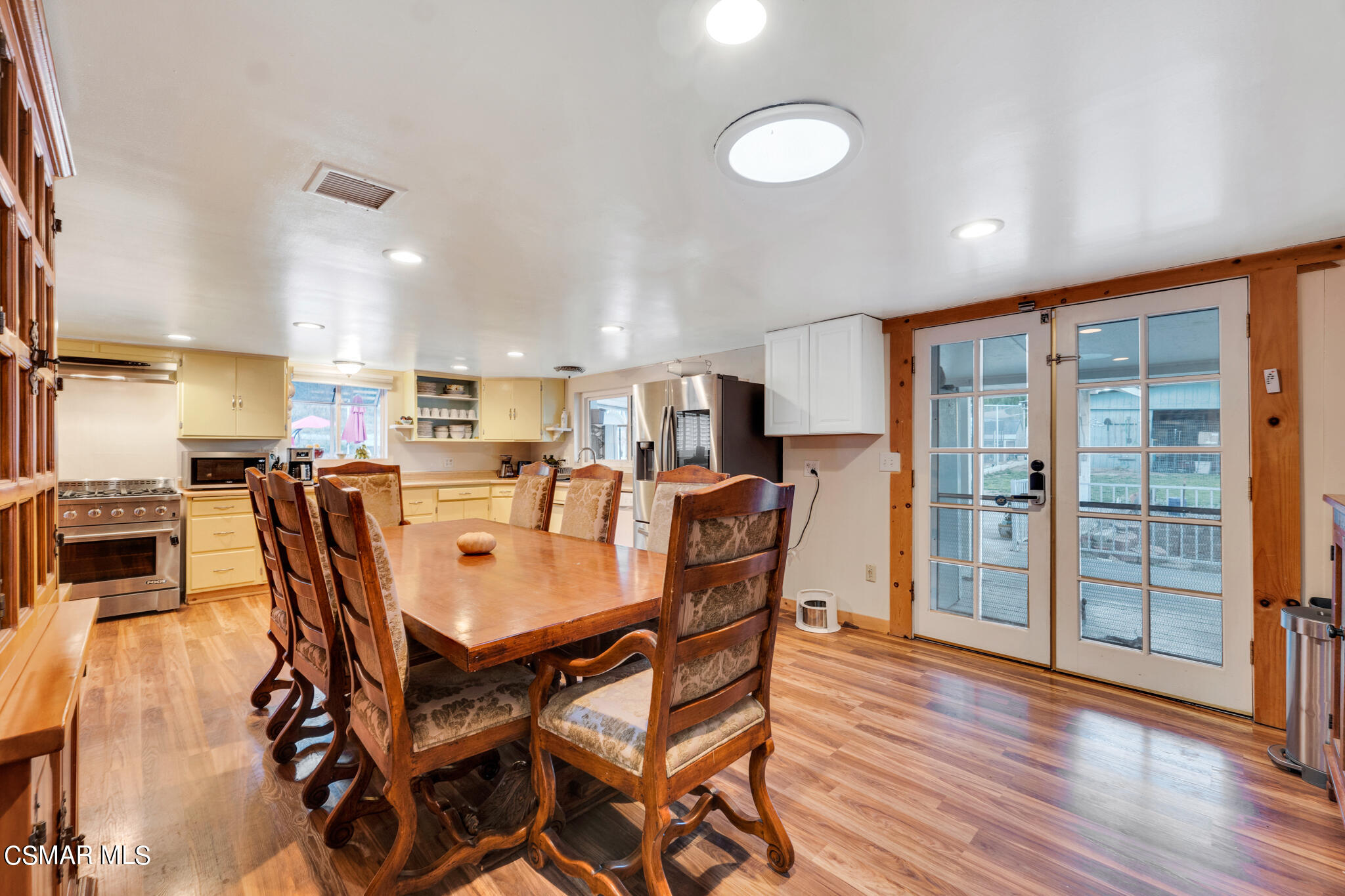 10767 Citrus Drive Moorpark, CA 93021 - Photo 29 of 65 a view of a dining room with furniture and wooden floor