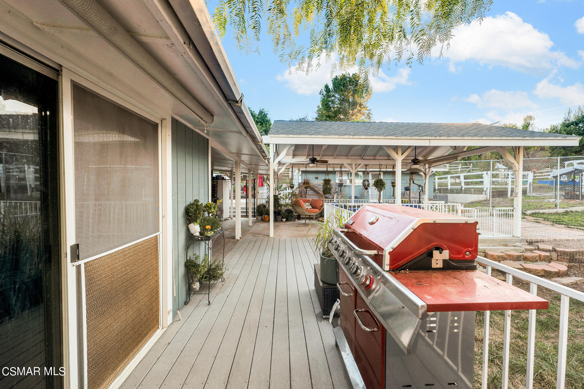 10767 Citrus Drive Moorpark, CA 93021 - Photo 40 of 65 a balcony with furniture and a potted plant