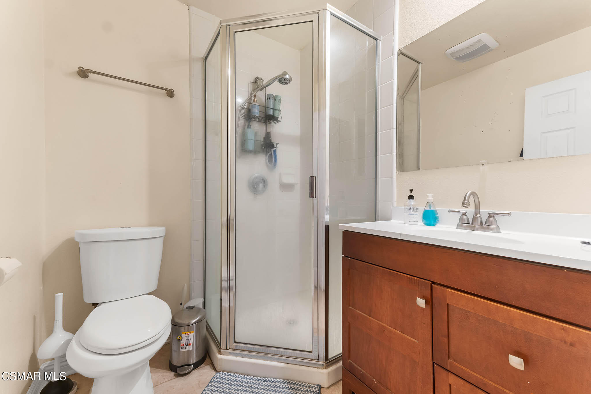 10767 Citrus Drive Moorpark, CA 93021 - Photo 50 of 65 a bathroom with a toilet sink shower and mirror