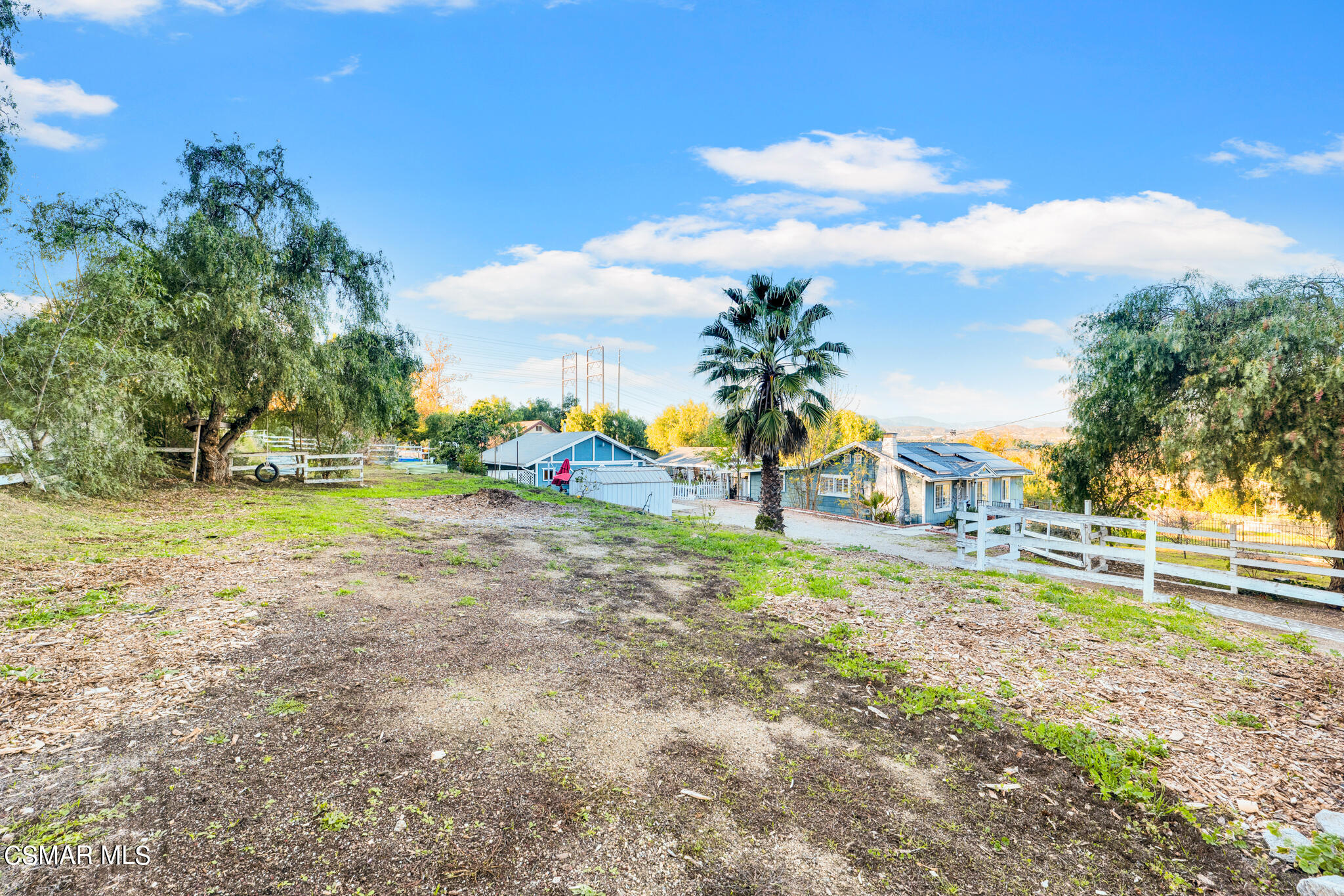 10767 Citrus Drive Moorpark, CA 93021 - Photo 6 of 65 a view of a yard with palm trees