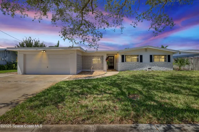 front view of house with a yard