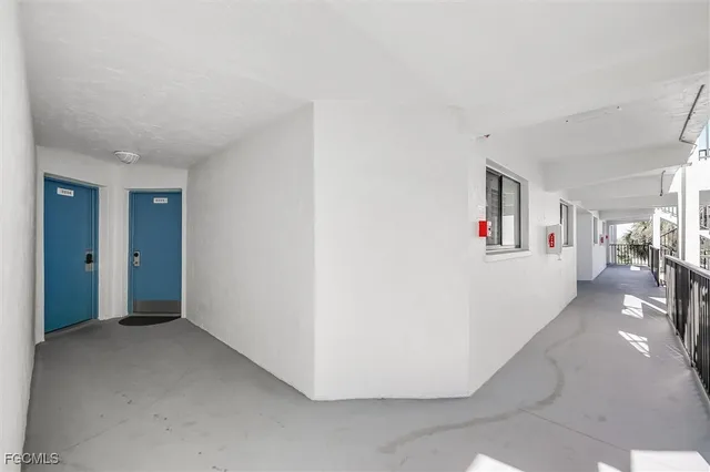 a workspace with furniture and window