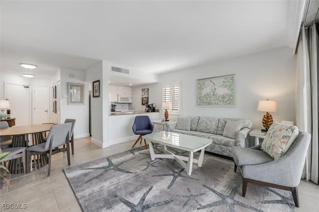 a room with furniture and a chandelier