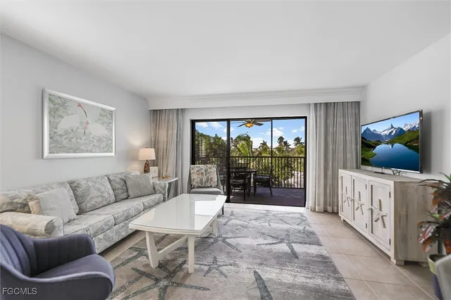 a view of a balcony with a painting on the wall