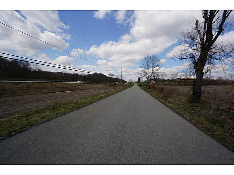 Carlton Road Bentleyville, PA 15314 - Photo 2 of 11 Exterior Front. looking the other way down Carlton Road with property on right and I-70 to your left
