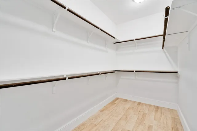 a view of an empty walk in closet