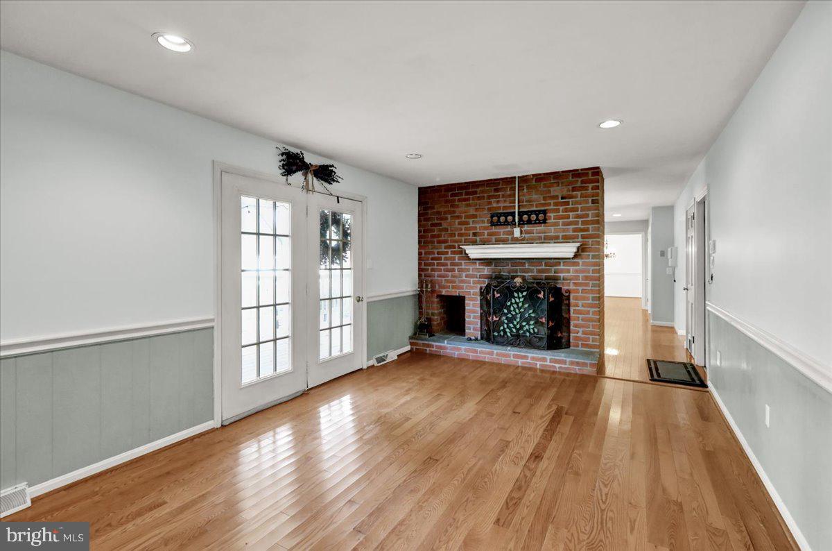 561 Millcross Road Lancaster, PA 17601 - Photo 18 of 52 wooden floor in an empty room with a window
