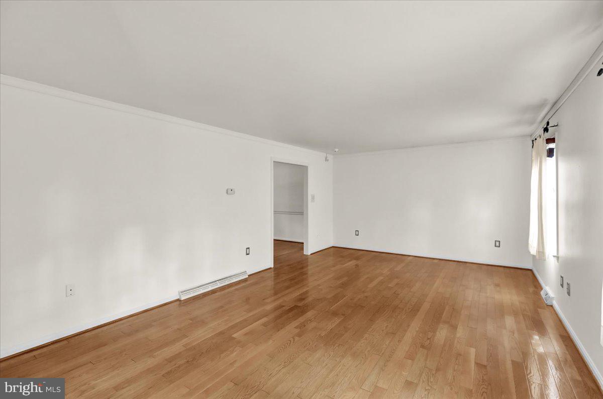 561 Millcross Road Lancaster, PA 17601 - Photo 6 of 52 a view of an empty room with wooden floor
