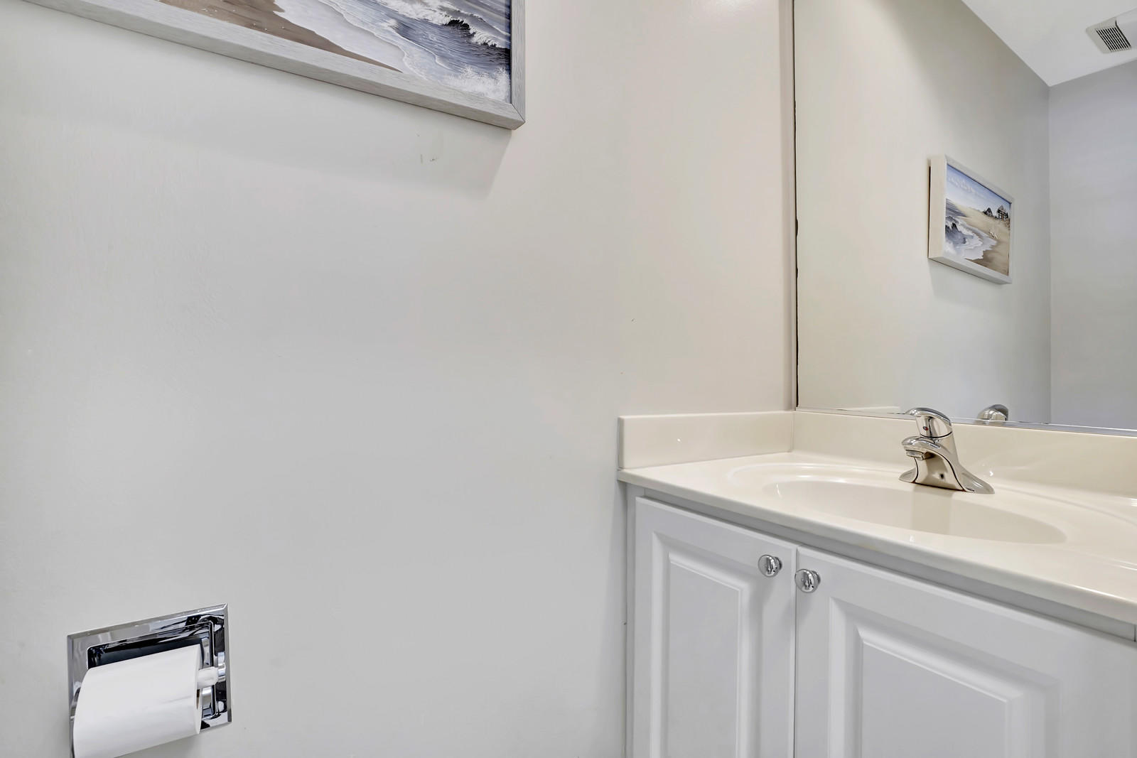 144 Radcliffe Court Jupiter, FL 33458 - Photo 9 of 28 a bathroom with a sink and a mirror