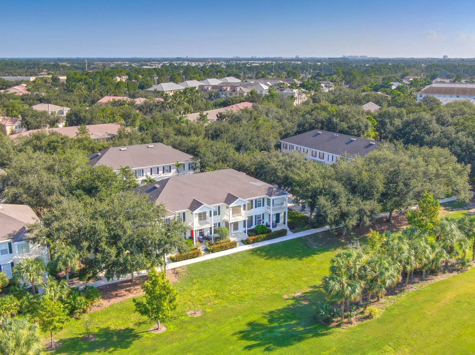 144 Radcliffe Court Jupiter, FL 33458 - Photo 2 of 28 an aerial view of residential houses with outdoor space and river