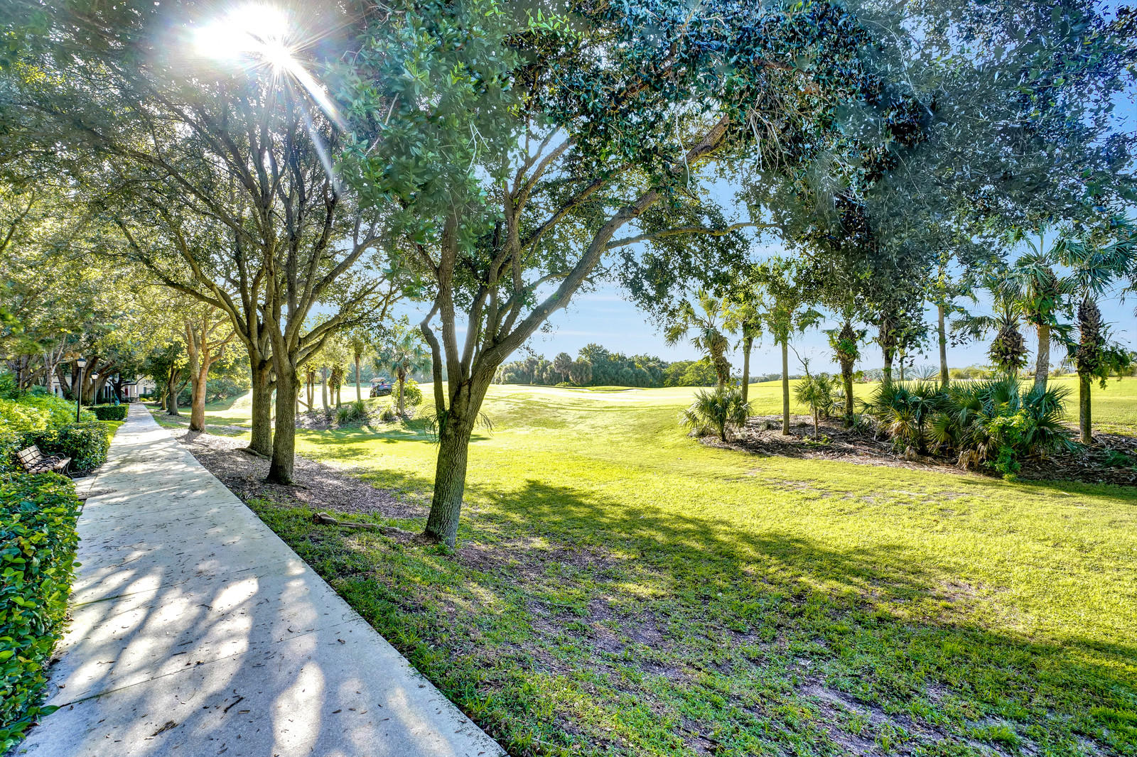 144 Radcliffe Court Jupiter, FL 33458 - Photo 19 of 28 a view of a swimming pool with a patio