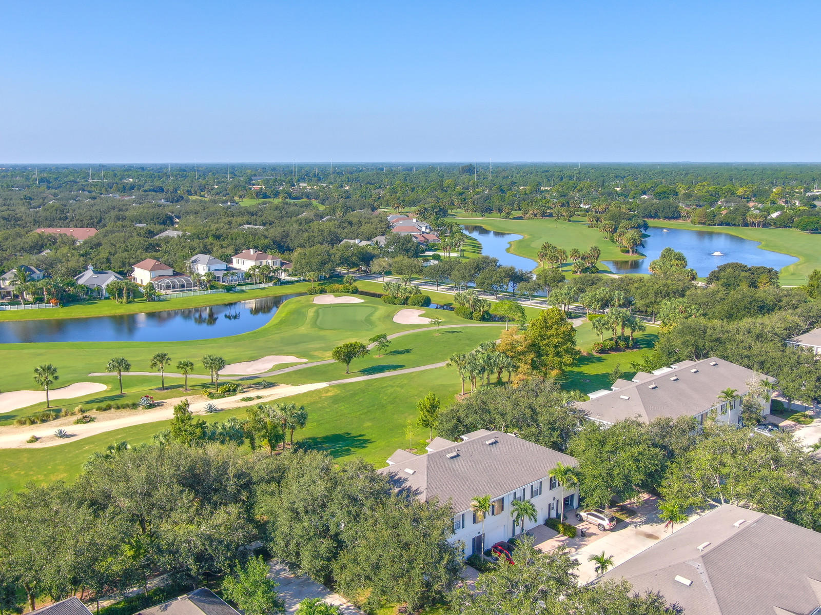 144 Radcliffe Court Jupiter, FL 33458 - Photo 21 of 28 an aerial view of residential houses with outdoor space and swimming pool