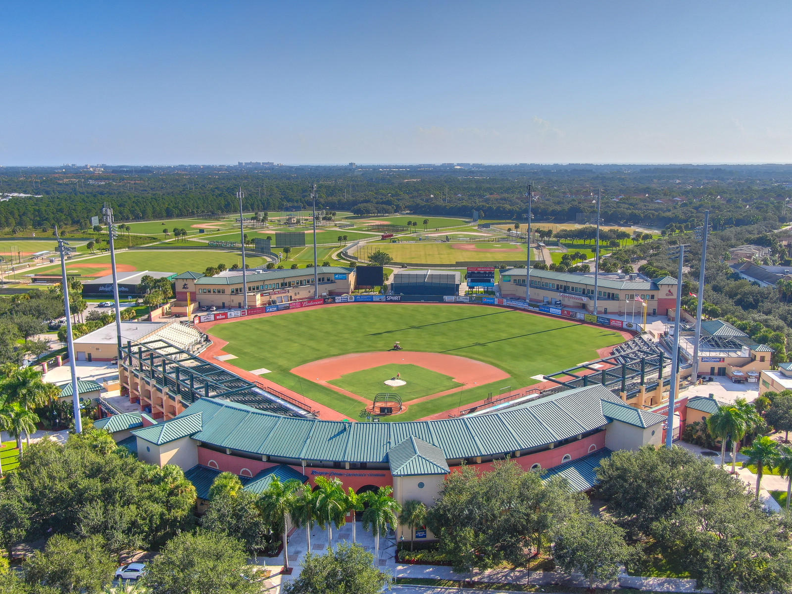 144 Radcliffe Court Jupiter, FL 33458 - Photo 26 of 28 an aerial view of a tennis ground and lake view