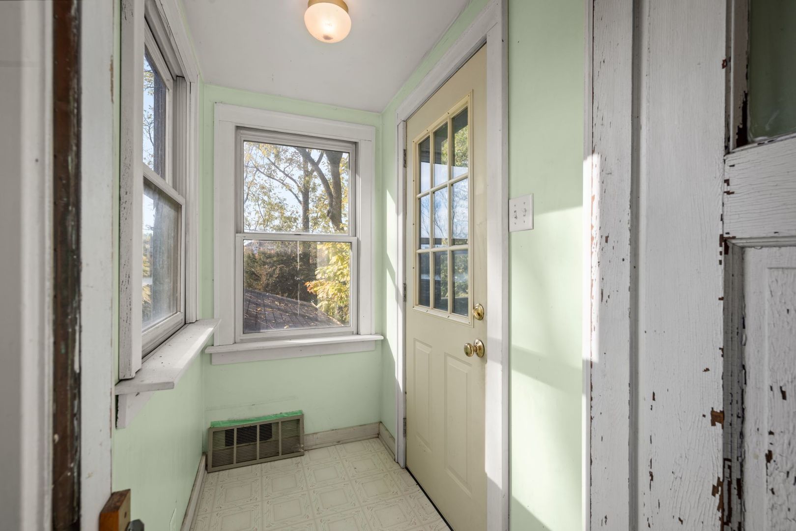 202 North Bennett Street Geneva, IL 60134 - Photo 19 of 40 a view of a room that has a bed and a window