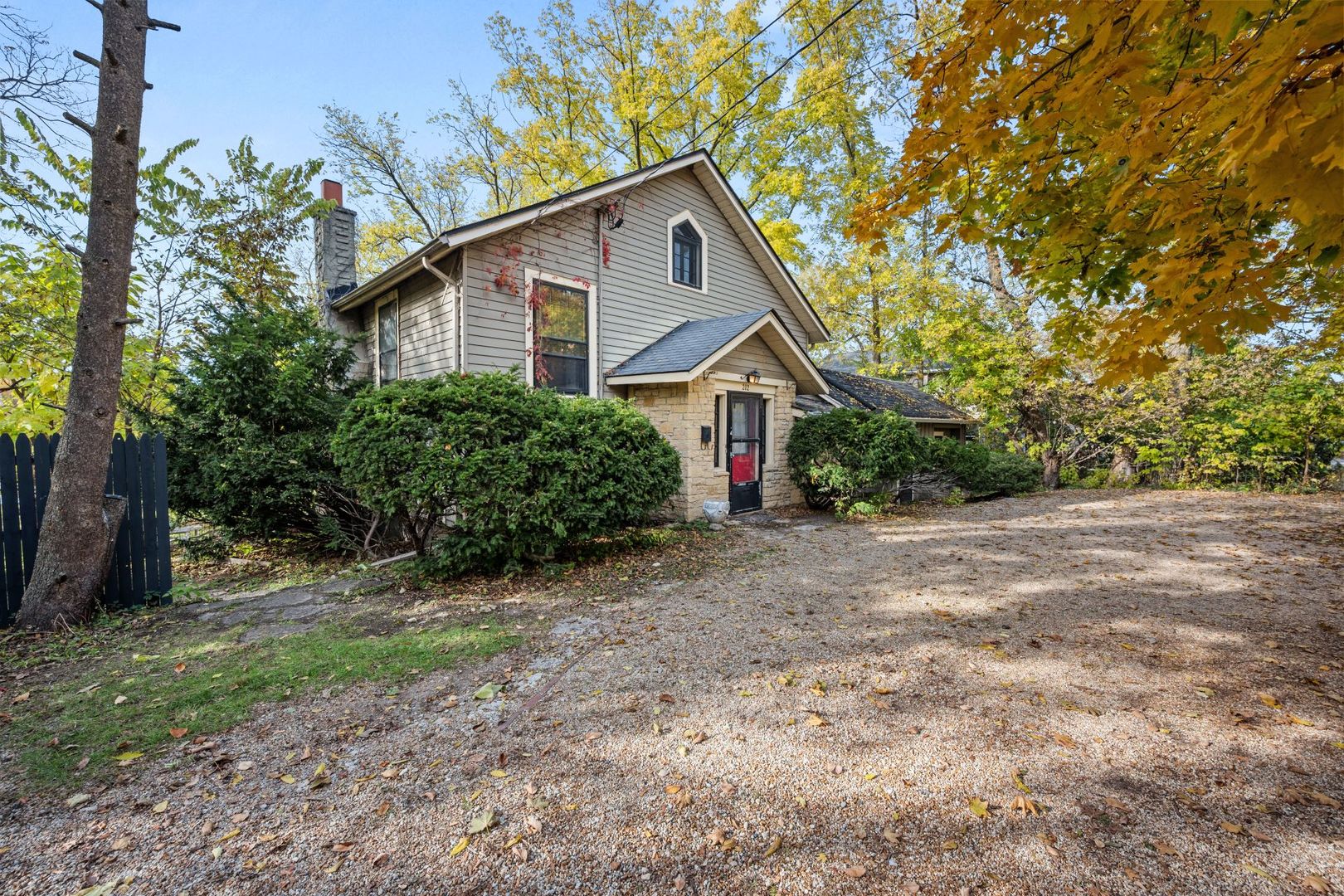 202 North Bennett Street Geneva, IL 60134 - Photo 2 of 40 a view of a house with yard and plants