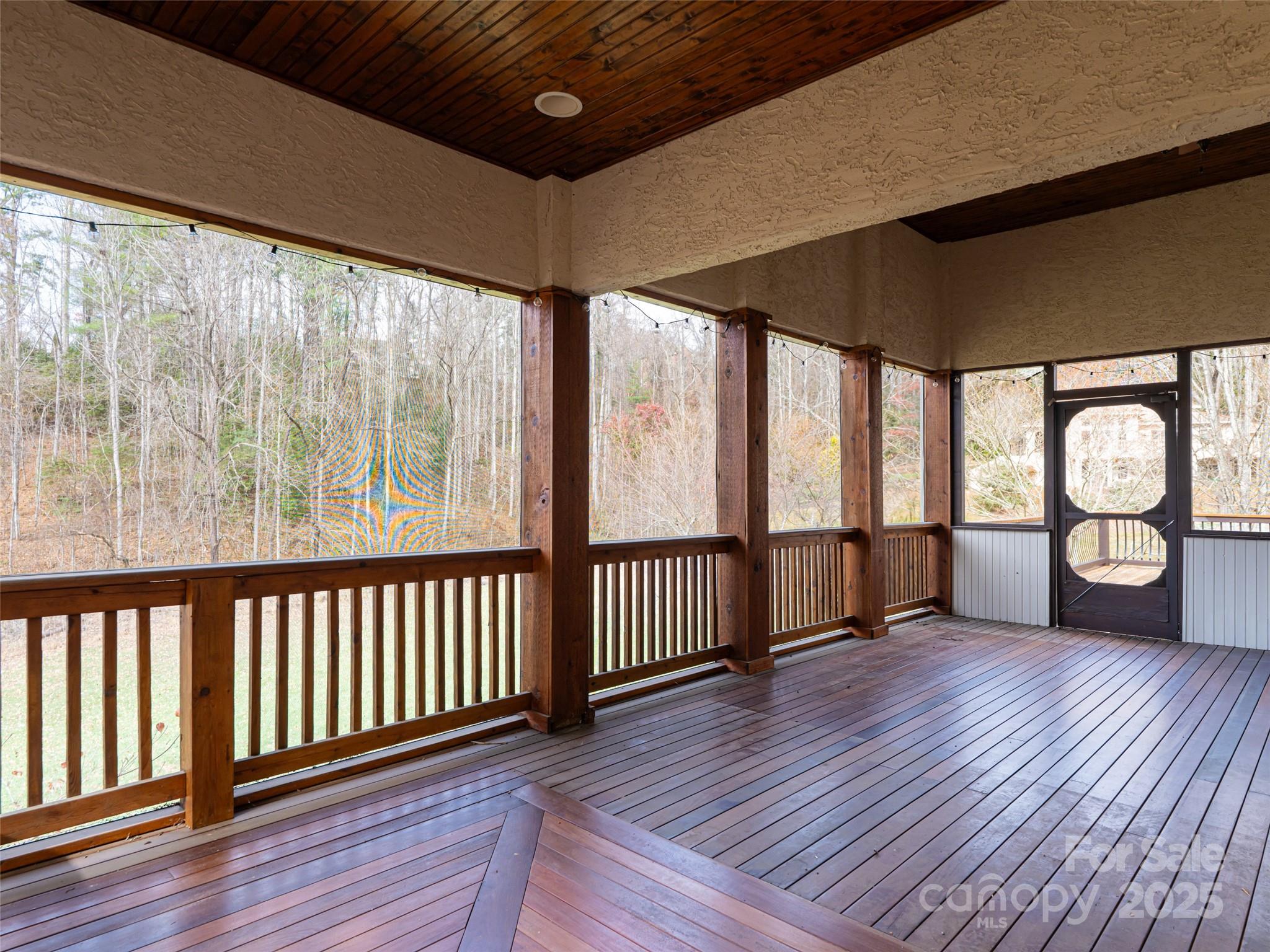 10 Walnut Lane Fletcher, NC 28732 - Photo 24 of 48 a view of an empty room with wooden floor and a window